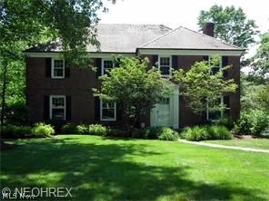 Updated all brick center hall colonial. Four bedrooms, two full baths on second floor. Third floor suite with bedroom and bath. All new windows, forced air and central air. Updated kitchen with granite countertops and all appliances. Library and sunporch on first floor. Finished lower level with fireplace, wet bar and glass block windows. Attached garage with newer garage doors. Fantastic back yard overlooking Canterbury Golf Club. Fantastic location close to freeway and top notch shopping and restaurants. Great commute to downtown, hospitals, museums and universities.