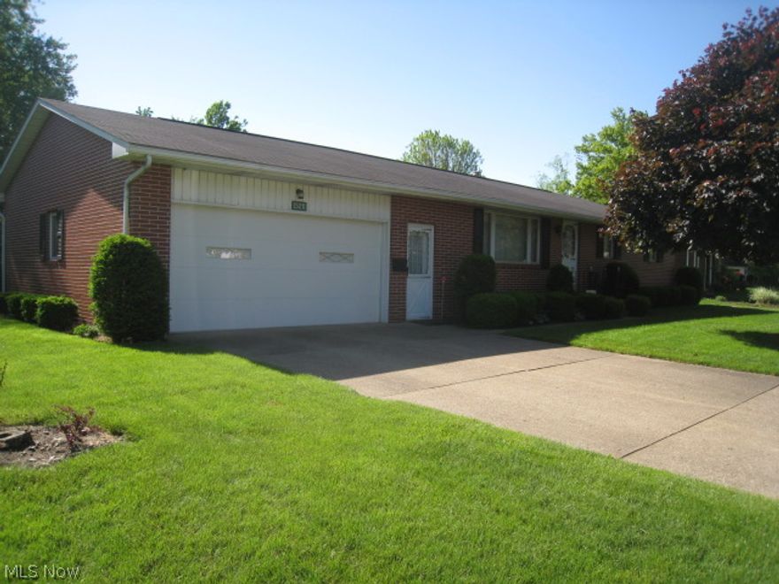 Immaculately maintained brick ranch with LR, DR, and fully applianced cherry Kitchen.  Private 1/2 bath off Master Bedroom, finished Rec Room with new carpet and a 2nd Kitchen on Lower Level and a 2nd full Bath.  Oversized 2-Car Garage too.  Relax and enjoy the covered back patio and gas grille.  So convenient to shopping, restaurants, and Massillon.