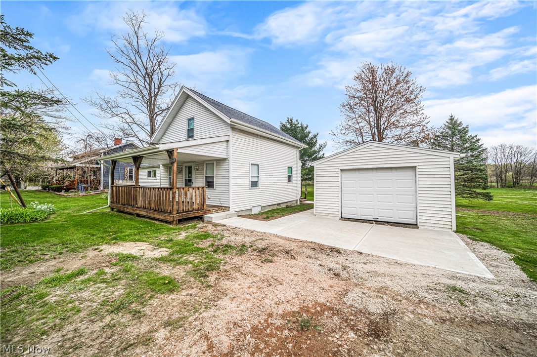 Cozy 2 Bed, 1 bath updated Bungalow, double lot that extends back to far tree line. Newer Front Porch. Some Newer Windows & Front & Back Doors, fresh paint, updated bath and flooring throughout.. Some New Vinyl Siding, back deck, fresh concrete poured in front of garage and sidewalks. Come take a look with your favorite agent.