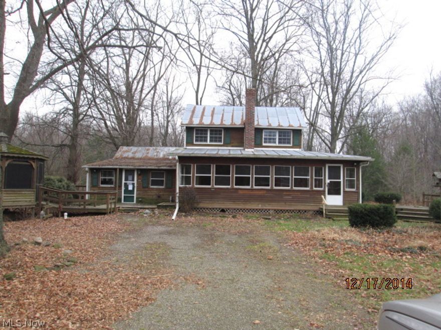 TAKE A LOOK!!!! Looking for LAND??!! With a house! And Barns! Here it is Folks!! This house is perfect!! Have horses but need more room?? Have cows? Goats? Sheep? or just looking for land?! Here it is!! This house has it all! 17 acres of woods and meadows as well two pole barns! Just can't ask for anything more with this house! Not to even mention how secluded it is! A beautiful view from every window and all the porches! Just a home you can truly enjoy without any one else around! Call today for a showing!