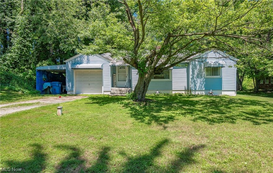 Welcome to 2125 Krumroy Road! Don't miss this 2 bedroom, 1 bathroom ranch sitting on a great full acre corner lot! Enter into your oversized living room boasting a fireplace and hardwood floors. Dining area and kitchen lead to the attached garage and back patio. Two great sized bedrooms with plenty of closet space and a full bathroom round out the main level. Enjoy entertaining your guests or relaxing in your large, treed backyard. This home is ready for your finishing touches! New septic system 2016 & new HWT 2023. Don't miss your opportunity. Schedule your private viewing today!