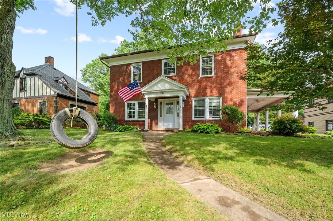 Welcome to this stately 2-story brick Colonial set on a generous, tree-lined lot just shy of half an acre. With mature landscaping and peaceful surroundings, the property offers a sense of space and privacy — delivering that country-like feel right in town. Inside, you'll find a thoughtfully updated layout featuring 4 bedrooms and 1.5 baths, freshly painted walls, updated trim, modern light fixtures, new ceiling fans, and double-hung replacement windows throughout that bring in plenty of natural light. A gas fireplace adds a warm focal point to the main living area, while each room pairs comfort with timeless character. Step outside to the expansive tiled patio porch with classic white columns — the perfect spot to relax or take in the view. The backyard offers plenty of space to unwind beneath the trees, with the occasional deer or wildlife passing through adding to the park-like atmosphere. A 2-car detached garage provides extra storage and functionality. Located just minutes from the school, park, library, and Route 36, this home offers the perfect balance of small-town charm and everyday convenience. Come experience all it has to offer!