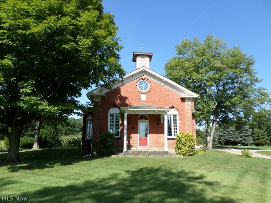 Own a piece of history with this one of a kind former school house remodeled into a house with attached garage + loft. 1 acre level lot. Country but only minutes from Rt. 21 & Rt. 30. Beautiful spiral staircase + exposed wood beams. Wood burner in liv. rm./great rm. Kitchen separated by butcher block counter + breakfast area.  Upstairs loft with 2 bdrms. & 1 full bath. 3rd bdrm. on 1st floor.