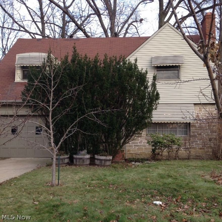 Charming three bedroom colonial. Formal living room with fireplace and formal dining room. Eat-in kitchen. Master bedroom with knotty pine paneling, large walk in closet and built in bookshelves.  Hardwood floors. Large bedroom with walk-in closet and knotty pine paneling. Finished rec room with bar. Covered patio overlooking wooded yard. Home Warranty provided. Great value!