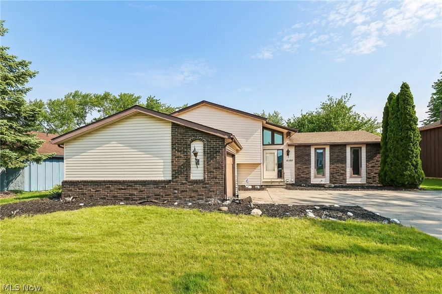 Discover the space and comfort your family needs in this inviting 3-bedroom, 2-bath Lorain home offering 1,916 sq ft of living space. The main level features bright, open living areas, while the finished basement with a built-in bar creates the perfect spot for entertaining, game nights, or weekend gatherings. Both bathrooms have a beautiful, updated look that adds a fresh, modern feel throughout the home. A new hot water tank installed this year provides added peace of mind. Outside, enjoy a 2-car garage and a yard with plenty of room for kids, pets, and outdoor fun. A warm, spacious home ready for its next family.