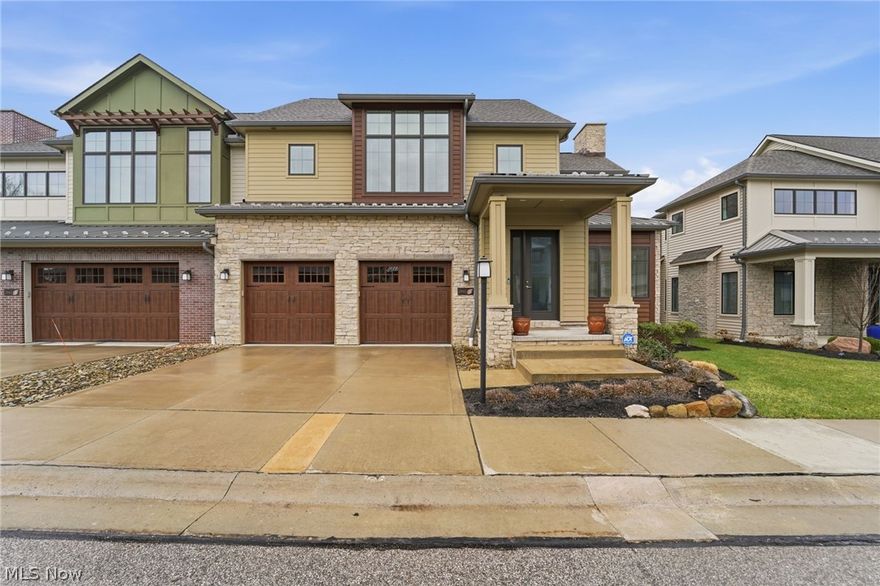 Welcome to 2440 Edgewood Trace, an exceptional, custom-designed Birch model with over 4,000 square feet of finished living space, a finished lower-level Rec Room and full bathroom.  Large high-end kitchen with Bosch appliances is a chef's delight with custom cabinetry and a 7' by 4' island.   And first floor 9' by 5' laundry with wall and cabinet storage with built in sink.  

Options for primary suite accommodations on first and second floors, all with ensuites and walk-in closet functionality.  Or utilize the spacious second floor bedroom as a den/study/personal library.  

Envelope yourself in the grand great room with 20' ceilings allowing natural light to illuminate the open floor plan that seamlessly connects the living, dining and kitchen area - perfect for everyday living and entertaining.  

Located in an exclusive gated Pepper Pike community just minutes from Legacy Village, Eton and Pinecrest.

Highly sought after Orange school district and close to the Chagrin Parks and Pepper Pike dedicated walking trails.

Premium lot with backyard privacy, Trex deck, gas grill hookup, stone and cement board exterior, Pella windows and metal roof accents.  Maintenance free living year-round.  

Features:

10' ceilings, 8' high solid core doors, 36" wide doorways
All bedrooms have ensuite bathrooms, powder room on first level
First floor bedroom features a 10' by 6' walk in closet, separate water closet and heated bathroom flooring system.  Suitable as a primary, guest or in-law suite. 
Kohler plumbing fixtures throughout the home.
Large loft area with wood flooring overlooking the great room.
Large storage/utility room utility sink.
Ample sized garage with polyaspartic floor coating system, Gladiator Brand Wall Cabinet and Geartrack systems.  Liftmaster Garage door openers and My Q Smart Home remote system, insulated garage doors. 

This home combines elegance, comfort and prime location in one of Northeast Ohio's most prestigious communities.