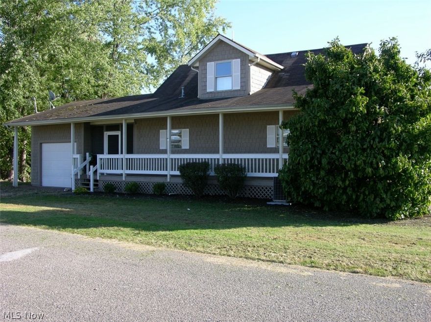 Awesome Riverfront home with windows galore on both levels for water views from everywhere, many decks for outdoor enjoyment, huge great room for entertaining and great river access to build your own dock if you like.  This one is a must see!