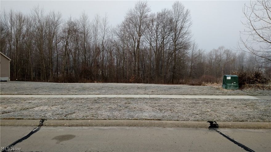 Build your dream home in the desirable Bayberry Estates! Bring your builder to this cleared and gently sloping 75' x 150' lot with access to city water and sewer. The lot borders expansive community maintained property giving the property the look and feel much larger than its actual size.  Bayberry Estates is an established development with amenities like neighborhood pool, exercise facility, club house, playground and a maintained walking path surrounding a wonderful wooded forest.  HOA fee is $50/month.