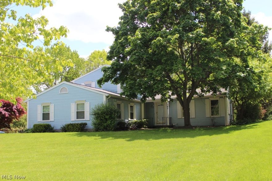 This spectacular downtown Hudson home has been completely renovated, top to bottom. Enhanced floor plan leads to an open concept family living space. The walls have all been removed and the flow of the home is conducive to today's modern lifestyle. The Kitchen is large and includes a center island with custom cabinets, lighting and granite countertops.  There are stainless steel Kitchen aid appliances, a custom pantry, under mount sink and a sliding glass door that leads to the expansive deck and very private yard. Looking for a space large enough for that long farm table?  This is it. It fits beautifully in this spaciously designed home. The Kitchen flows nicely into the Family room that includes a fireplace that is flanked with bookcases on either side. A wonderful place to enjoy gatherings. Another nice feature is the first floor bedroom and full bath, as well as the first floor laundry that includes a sorting and folding counter and cabinets. The second floor includes 3 ample sized