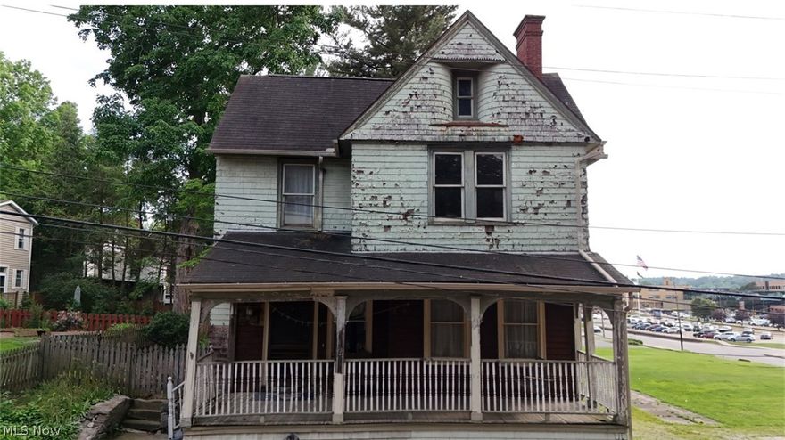 ***Back on the market by no fault of the home*** This is your chance to get your foot in the door to West Virgina's largest and most prestigious historic district - Julia-Ann Square. Insert Real Estate Buzz Words and Phrases Here: "find of a lifetime", "vintage restoration", "HGTV special", "opportunity knocks", "Investment property", and don't forget "location, location, location". These are all true for this home! The house is functional and move-in ready; it just needs someone to love on it. Why not you? The exterior is rough. Really rough. Let's talk about what makes this house amazing today and not just some day in the future after some restoration. This classic 1895 Victorian home has all of its original woodwork. This alone makes this house incredibly valuable for the next owners, as no, they don't make them like this anymore. Not even close. Be the envy of your friend circle owning this masterpiece with two sets of opulent, fully functional - original - pocket doors, arched doorways, curved hallways, a spacious living room with perhaps the most ornate fireplace in the zip code, formal dining room with incredible built-in butler serving buffet and fun kitchen food pass through door - all touches from the Victorian era. Functionally this home has it all - four bedrooms, two and a half bathrooms, large, eat in kitchen, back stairwell, garage, huge basement, and 2,056 square feet of living space. This hidden treasure is located in West Virginia's largest and most Prestigeous historic district - Julia-Ann Square. The potential financial upside to restoring this home is actually quite remarkable. Get your foot in the door to Parkersburg's premier spot and stay or restore this sleeping giant and make a tidy sum on the back end. The average sale price in this neighborhood over the last 36 months, for move-in ready homes, is $260,000.  This home is a steal. Come take it away. What you see is exactly what you get as this home is being sold as is.