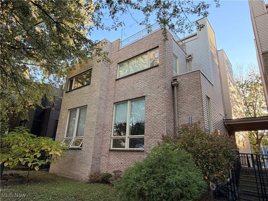 Fantastic townhome with sweeping city views in the heart of Tremont — and NO HOA!
Versatile, sun-filled living spaces throughout. This rare unit features an attached 2-car garage, soaring ceilings, oversized windows, a spacious eat-in kitchen, granite counters, stainless steel appliances, and three outdoor city-view spaces, plus a convenient upstairs/bedroom level laundry area.
This updated home features new flooring throughout. Beautiful hardwood floors and stairs. New upscale carpeting in the bedrooms. New painting. Glamorous new master bath. Level 2 EV charging station in the garage.
The primary suite offers a walk-in closet and an ensuite bath. The top floor showcases two rooftop patios with stunning downtown skyline views. Nicely updated and well maintained, this is the contemporary, elegant Tremont home you’ve been looking for.
Impressive from the moment you enter—step into the open foyer leading to the dramatic living rm with solid wood floors. Incredible natural light & neutral finishes throughout. The next level features a large, open gourmet kitchen with stainless appliances, extensive cabinetry, hardwood floors, and granite counters. The floor plan on these main levels is perfect for entertaining, with great flow between the living room, kitchen, and dining/second living space. Visit with the cook at the breakfast bar or step through the sliding glass doors to the first of three outdoor living areas.
The bedroom level includes two large bedrooms, each with its own full bath. The owner’s suite offers a spacious bedroom with a sitting area, walk-in closet, and luxury bath with enclosed shower.
The top floor is an entertainer’s dream — featuring a built-in wet bar and two rooftop decks with panoramic views of Tremont & Downtown. This level can also function as a third bedroom or private office.
All this incredible space in one of the most desirable locations in northern Tremont — residential, yet just a short walk to all the neighborhood’s amenities.