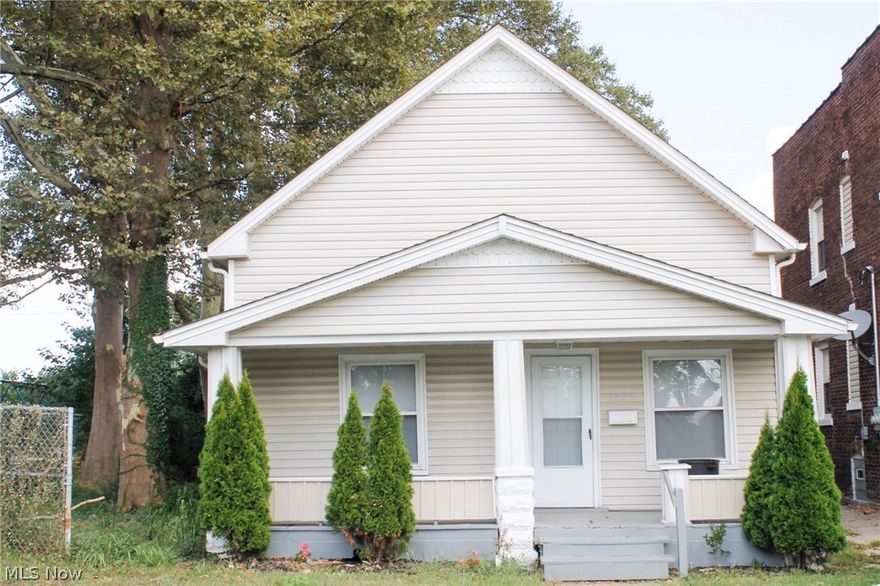 The front unit has 2 beds and 2 full baths, the second unit is occupied. 
The home is located next to a park.