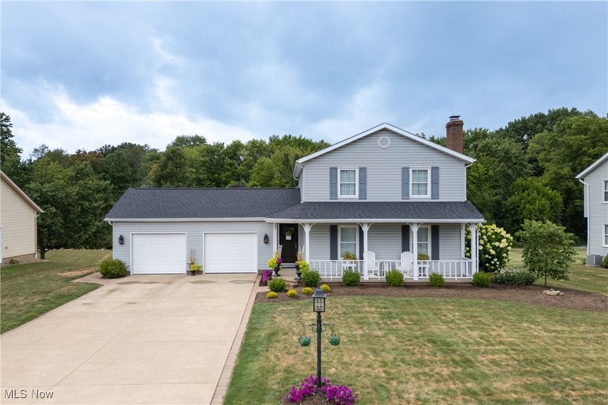 Ready to be introduced to a gorgeously maintained classic home with tons of features you're going to love? I thought so. The picturesque front porch and adorable landscaping welcome you in. First impressions are accurate here - everything is clean, bright, and just waiting for you to move on in. Inside, the layout has an easy flow with tons of windows and natural light throughout, the living room has a great wood-burning fireplace, all in brick with a gorgeous wooden mantle. The kitchen is spacious, with both bar seating and an eat-in dining area that perfectly fits a table and chairs. Large windows give you a great view, and there is a ton of storage. A convenient half bath and laundry room are here as well. The newly added sunroom is gorgeous, with high ceilings, beautiful light fixtures, and a wall of windows. Off the back is a wooden deck and a large, lush yard. If the two-car attached garage isn't enough space, you have an additional storage shed in the backyard. Upstairs is the primary bedroom, a shared hallway bathroom, and two additional bedrooms. The lower level of the home has high ceilings and could be finished for additional living space if that's your thing. The neighborhood offers plenty of charm and great sidewalks. You're about a mile from Hartville (with cute restaurants, markets, and community activities) so the location is a huge plus. This home won't last long - act fast if you want to make it yours!!