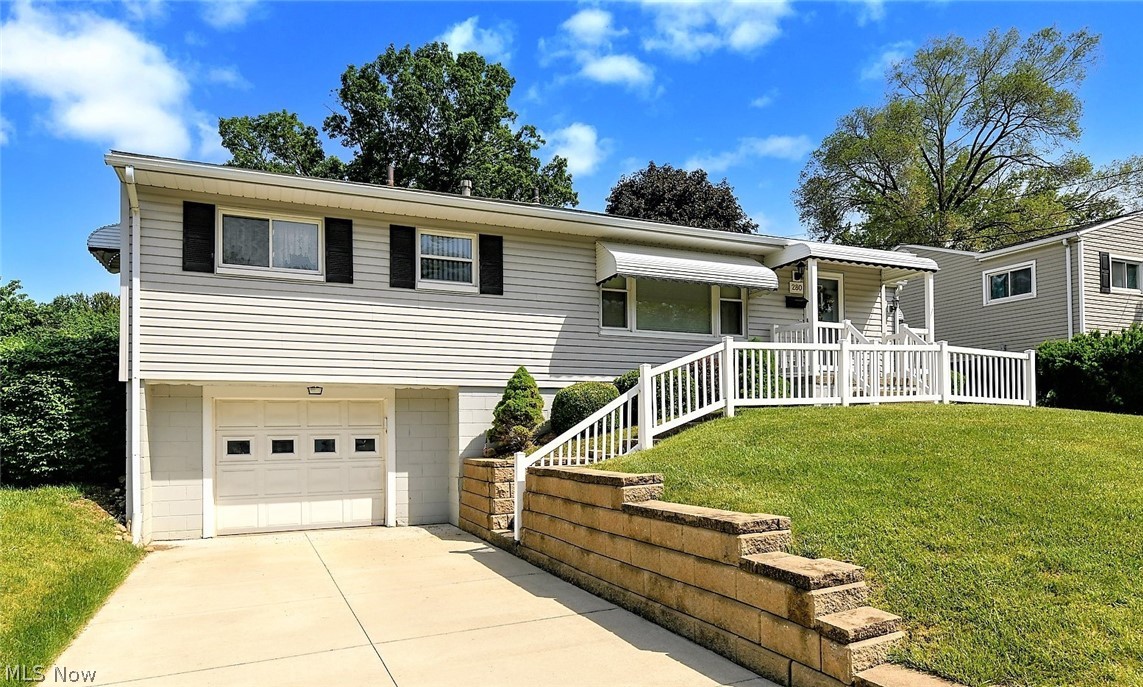 *Beautiful Raised Ranch In Ellet W/1800+ Sq. Ft Of Finished Living Space Including 3 Bedrooms, 1 Bath, Attached Garage & FINISHED Basement W/2nd Kitchen For Entertaining! *SOLID Property Inside And Out! *Major Updates Include: New VINYL SIDING, WINDOWS & ROOF *New CONCRETE DRIVEWAY, RETAINING WALL & VINYL RAILING *Updated SLIDERS In The Sunroom Addition *2020 Genie Garage Door Opener *Walk In To A Large Living Rm W/Picture Window *Eat In Kitchen W/Updated Hunter Ceiling Fan & Led Light Provides Tons Of Cabinets & Is FULLY Applianced With Refrigerator, Dishwasher, Stove & Microwave *Sunroom W/BEAMED VAULTED 10' Ceiling Flanked By Sliders To The Front AND Back Yard!! *Bdrm #1 Has Ceiling Fan W/Convenient Built In Belt/Purse/Scarf Holder *The 2nd Bdrm Has Double Clothing Racks & 3rd Bdrm W/Ceiling Fan *1st Floor Bathroom Showcases TILE Floor, CUSTOM Wall To Wall Vanity & Countertop, Black Accent TILE Backsplash & Tub Surround! *ENTERTAIN In The FULLY FINISHED LOWER LEVEL!! Consisting Of