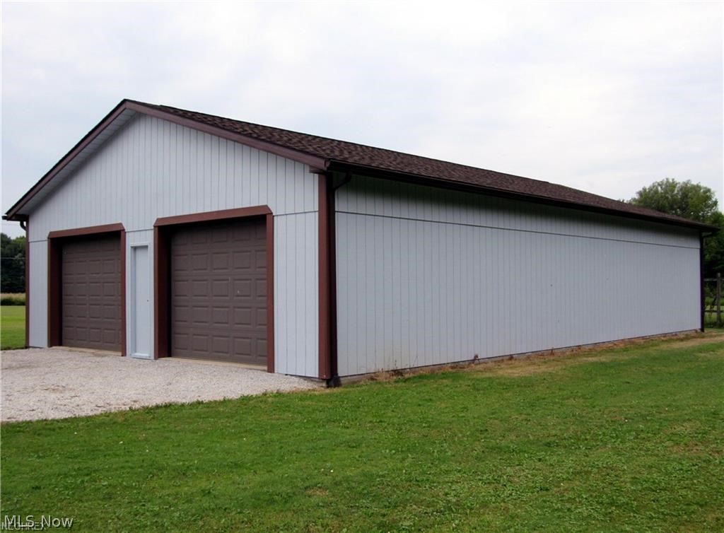 Take a look at this beautiful 3.42 acre lot with a mobile home that has been completely rebuilt consisting of new floor joists, new floor, new walls, new plumbing, new electrical, new kitchen cabinet and more. New Pella windows, new doors, 6" insulation in floor and walls, 18" insulation in ceiling. Add a few walls and add a bedroom or 2. New well in 2017, natural gas installed in 2016. The nice well built garage has electric, and door openers. Producing apple tree in front yard, and producing grape vine in front of the garage. This property has been well maintained, and is ready for you to move into, and enjoy! Make your move today, before it's gone!
