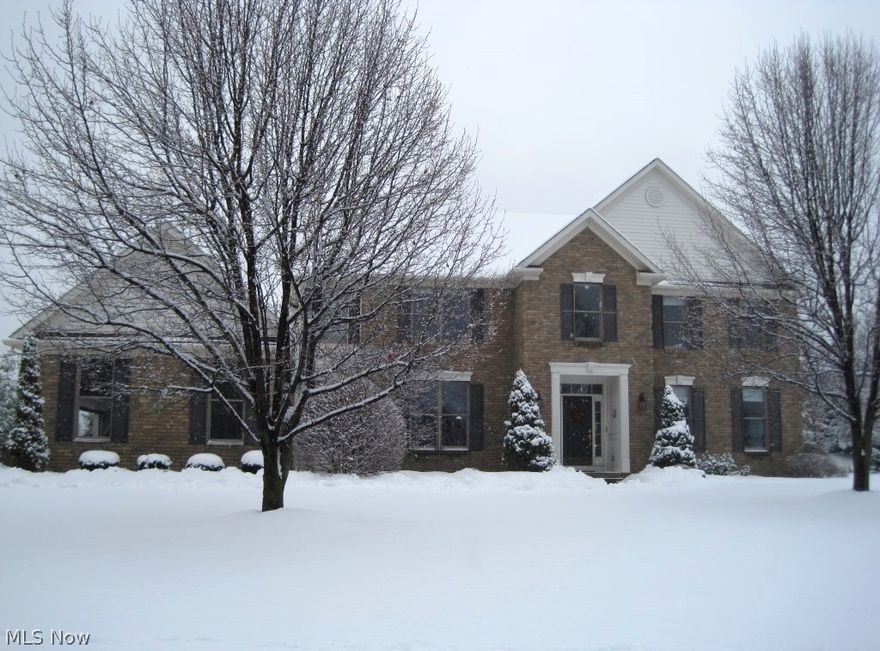 Stunning, Rosemont Ridge custom built home by Vaunt Builders.  Open, airy floor plan with spacious room sizes and custom window treatments throughout.  Two story foyer with hardwood floors.  Built-in shelving/cabinets flank the front door.  Formal living room with French doors open to Great room with fireplace. Formal dining room with tray ceiling. Chef's kitchen boasts granite countertops, SS appliances, hardwood floors and island/breakfast bar. Ample cabinetry with planning station.  Separate eating area overlooks inviting all season sunroom with access to deck. Luxurious master suite with sweeping ceiling, walk-in closet and master bath with dual sinks, Jacuzzi corner tub and separate shower. Three additional generously sized bedrooms with double closets, main bath, and jack-n-jill bath complete the second floor.  Convenient first floor office and first floor laundry.  Partially finished basement with full bath.  Newer furnace, sprinkler system and fenced yard. Crisp, clean and neut