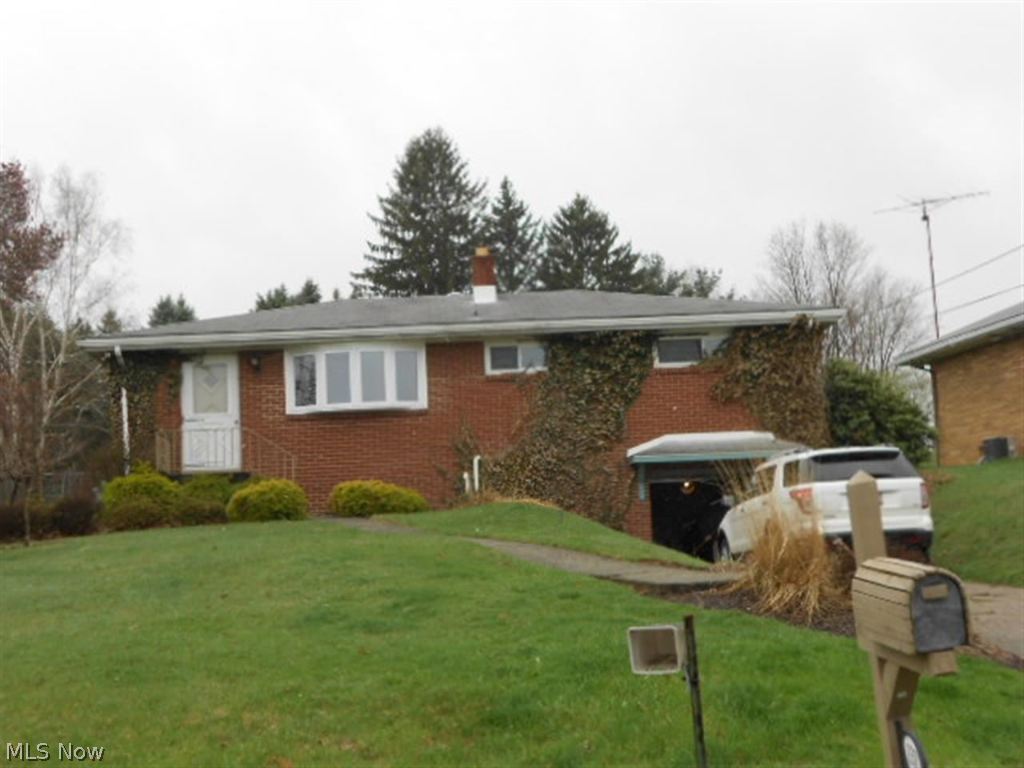 Cute 3 bedroom brick home with huge fenced in back yard. Covered back porch is almost the length of the house. Kitchen has been updated with newer cabnets, Quartz counter top, Laminate floors and bamboo walls below the chair rail. Wood stove in Rec Rm. Must see.