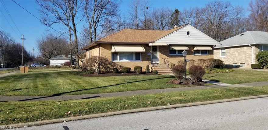 Welcome to 6388 Anita Dr a three bedroom brick hip roof ranch with stunning curb appeal that sits on a private partially fenced quarter acre corner lot. Plus a large two car brick garage connected by a covered walkway from the back door of the house. Interior features kitchen with a dinning area and living room
completely carpeted but hardwood as well under carpet. Extremely well maintained over the years but can use your colors and carpet or go with the existing hardwood.  Also, features 1 1/2 bath on main floor plus finished recreation in basement with glass block windows for your security makes a great place for family events. Separate laundry area with plenty of storage space for your things. Don't delay see today.