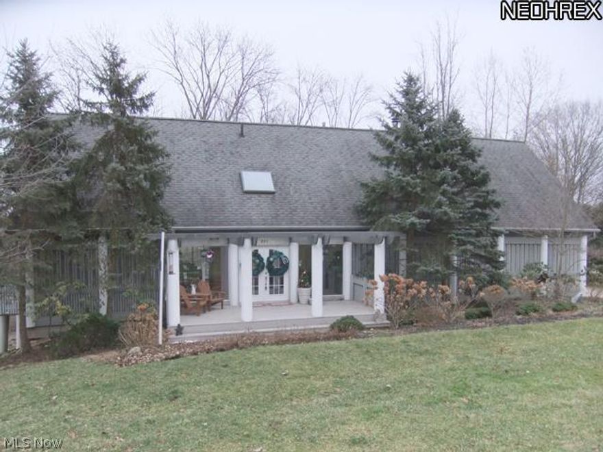 Gorgeous Contemporary - wall of sliders lead to multiple decks. Updated kitchen with granite counter tops and natural stone floor. First floor den with slider to deck. Living room, kitchen, bathroom - all open. Great for entertaining. Lower level with family room, slider to patio, 4th bedroom and bath, 1st floor laundry room, updated with newer cabinets and granite counter tops. Master bedroom - all marble with walk-in shower. Seller provided home warranty. Also available for rent - MLS# 3462960.