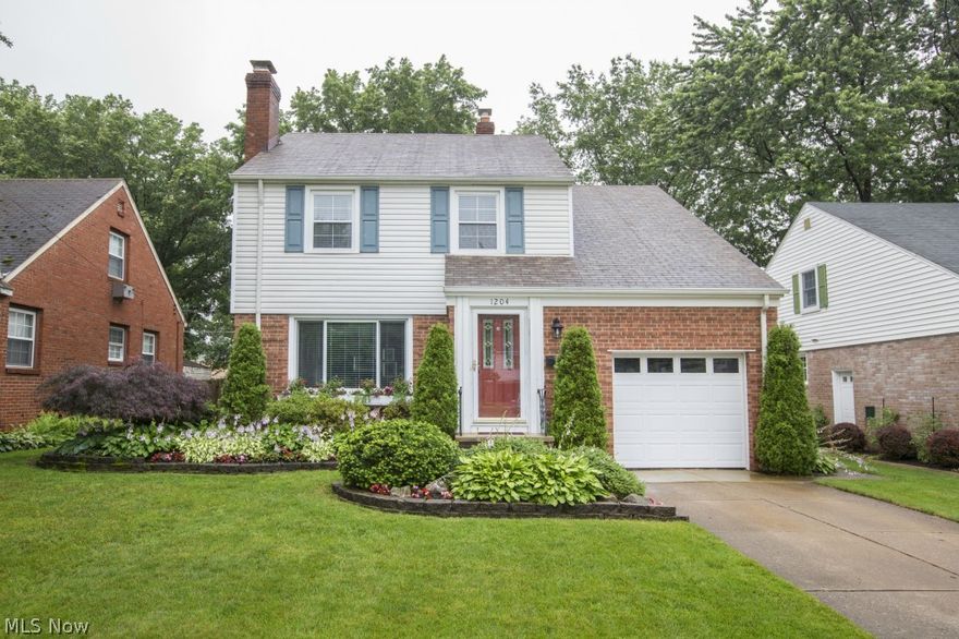 Unbelievable Find!! 3 Bedroom, 1.5 Bath Colonial with the "WOW" factor throughout.  Gleaming hardwood floors! Spacious Eat-in Kitchen with Corian counters includes Tiered Breakfast Bar, ample workspace and custom cabinets galore! Open to Living/Dining Rooms with gas fireplace. Super-cute sun room looks out to pristinely manicured yard, brick paver patio and shed! Blue Ribbon Schools! Easy access to I-90 and just 15 minutes to downtown Cleveland! Enjoy the City Park at the end of the street. Excellent neighborhood.