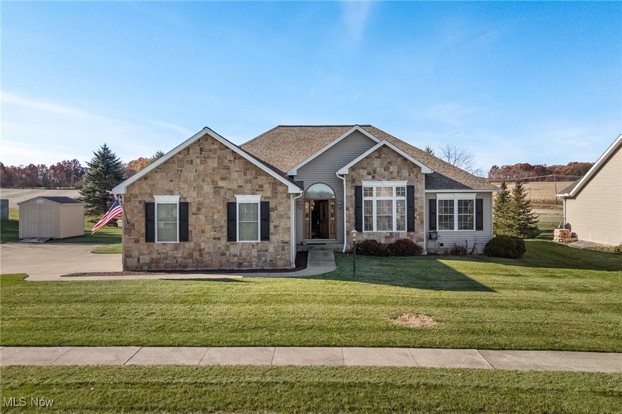 Beautifully updated 3-bedroom, 2.5-bath open-concept ranch that perfectly blends comfort, style and functionality! Step inside and you'll be greeted by a spacious open floor plan ideal for entertaining and everyday living. The kitchen features all new Bosch appliances (2023) and flows into the dining and living areas. There is new flooring throughout (2023) and a new roof (2023). The full basement offers endless possibilities-ready to be finished into additional living space, a rec room or home gym.  Relax outdoors on the covered rear composite deck, perfect for morning coffee. Take advantage of the new shed (2023) for extra storage. Additional highlights include the 2-car attached garage and new washer and dryer (2023). This move-in ready home has it all-modern updates with an open design. Don't miss your chance to make it yours!!