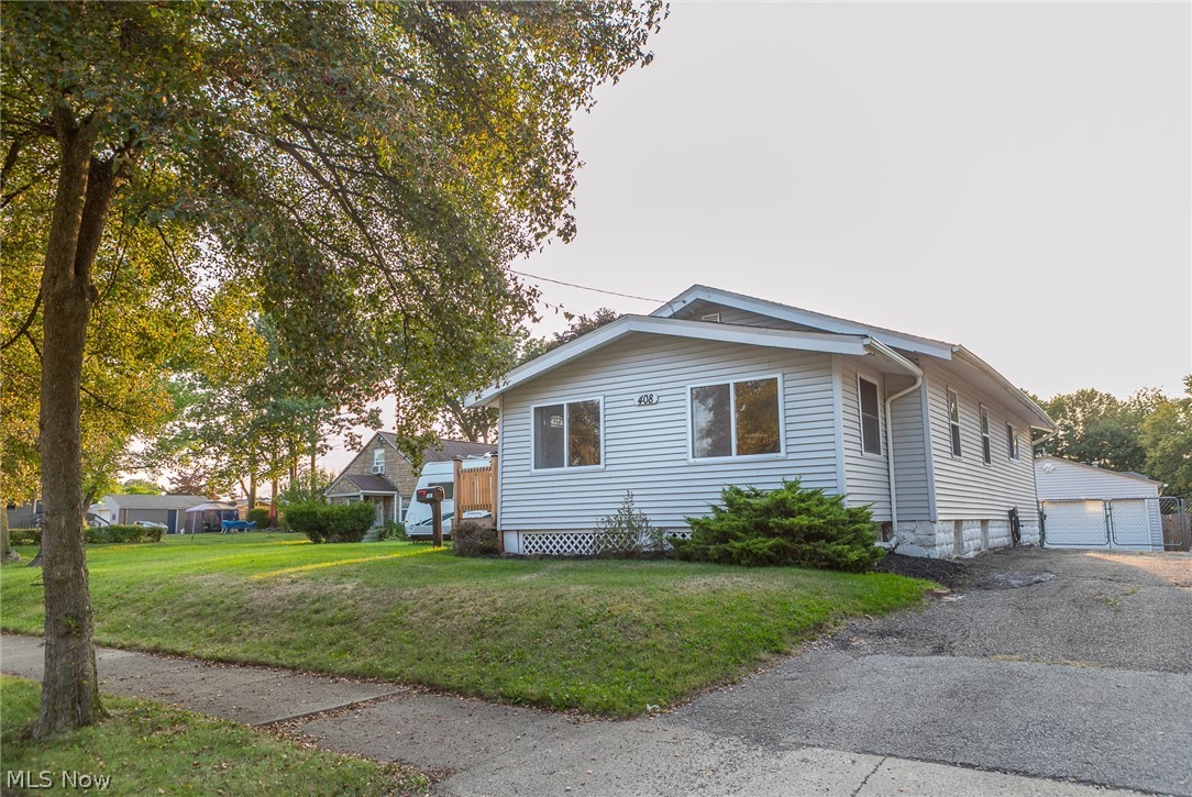 This gorgeous, move in ready home is looking for its new owner! Walk into the lovely enclosed front porch, perfect for storage or a drop zone. The living room with ample windows flows nicely into the dining room. Entertaining is a breeze in this fully equipped kitchen. The master bedroom even boasts an en-suite bathroom with tiled shower and walk in closet. Rounding out the tour is another bedroom and half bath, perfect for guests. The back of the home has another enclosed porch area leading to the expansive deck. The fully fenced yard leads to the 2 car garage. Weekend projects are a breeze with the walk out basement! Call your favorite realtor to see this gem today!