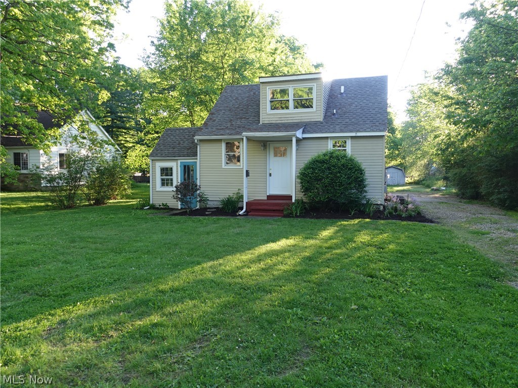 Cute as a button! This is a great opportunity for an investor or consider buying your own home for less than renting! Just move in to this super cute property in Stow! Good amount of kitchen cabinets and counter space, pantry and brand new stainless steel appliances (2020), nice bath, spacious living room with sliders to back patio to huge, flat backyard. Even has a first floor laundry room with cabinets for storage. Upstairs, you will find 1 large bedroom with built ins and another bedroom OR use the second bedroom as a good sized walk in closet! Nice area/separate room can be a 3 season sun room. New carpeting - 2020 and new roof - 2019.