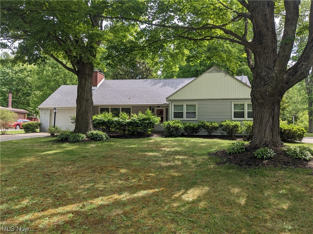 This enjoyable four bedroom home is located on a beautiful 80' x 365' park like lot! Interior features four bedrooms, 2.5 baths, hardwood flooring, full basement, two fireplaces, much more! Newer kitchen appliances and washer/dryer included! Exterior features include a huge backyard, patio with hot tub, and handy storage shed. Updates to the home include a new roof in 2020, updated windows, kitchen cabinetry, 95% furnace, more! Steps from the KSU campus and close to shopping, bus lines, etc.