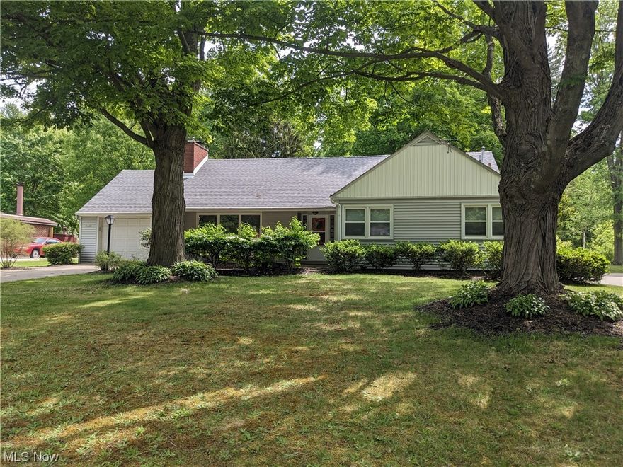 This enjoyable four bedroom home is located on a beautiful 80' x 365' park like lot!  Interior features four bedrooms, 2.5 baths, hardwood flooring, full basement, two fireplaces, much more!  Newer kitchen appliances and washer/dryer included!  Exterior features include a huge backyard, patio with hot tub, and handy storage shed.  Updates to the home include a new roof in 2020, updated windows, kitchen cabinetry, 95% furnace, more!  Steps from the KSU campus and close to shopping, bus lines, etc.