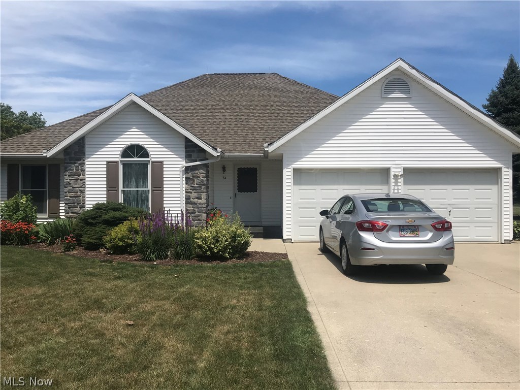 Well cared for three bedroom, two bath ranch located on a cul-de-sac. Large lot, fireplace in living area, and enclosed porch. Large kitchen with peninsula and bar seating. Roof completed in 2017.
