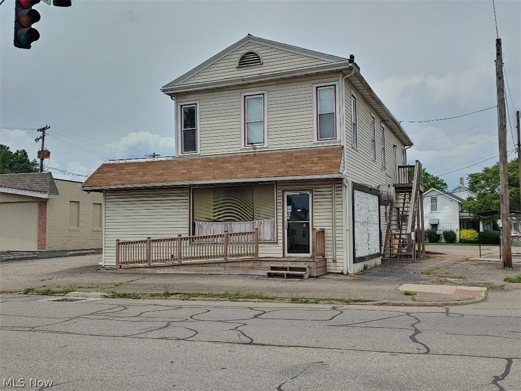 Upstairs apartment has a private entrance and is a 1 BR, recently updated and ready to rent.
Down stairs was set-up as a pizza shop and is in need of finishing.