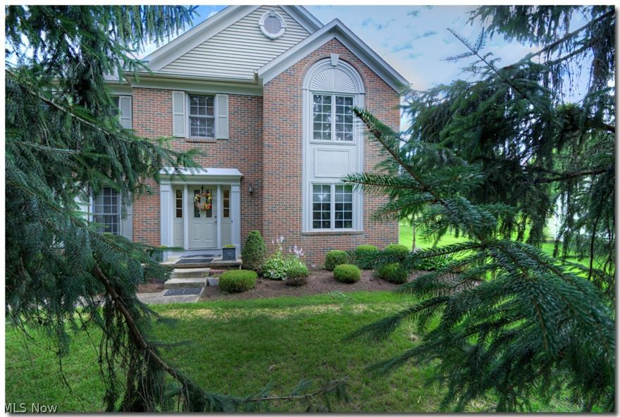With the driveway off of Duffield Drive, this stately 4 bedroom, 2.5 bath, brick front Colonial has been lovingly maintained and updated for your enjoyment. In addition to the 4 generously sized bedrooms upstairs, the main floor boasts a fabulous library with top grade hardwood floors and a built-in bookcase. The light-filled kitchen is open to the family room and to the breakfast area, which overlooks the expansive back yard through a bay window. The glamour master bath has a brand new shower and most faucets throughout the house have been updated, as have the doorknobs and some lighting. The roof was replaced in 2012. There is not enough room here to describe it all. Schedule an appointment to see it for yourself today!
