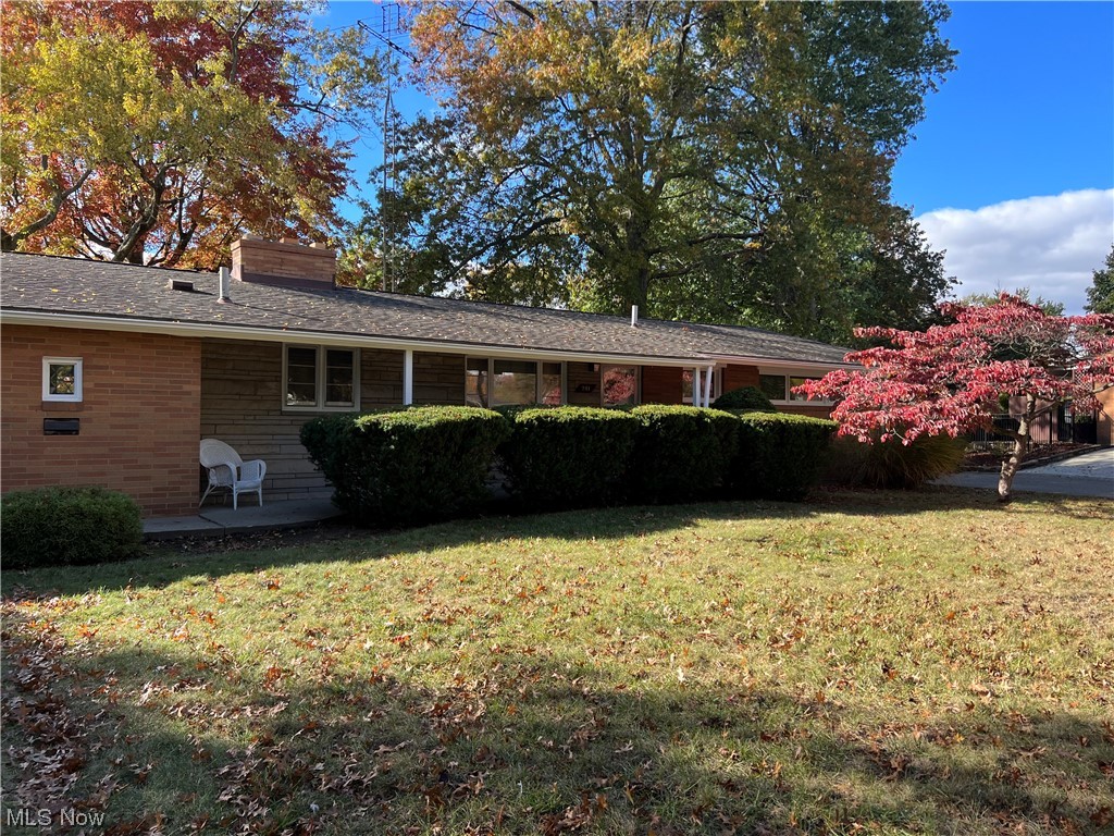 BRAND NEW furnace and AC! The heavy work has been done for you! Wonderful opportunity to get into this fantastic neighborhood before the holiday season begins! This super clean ranch is the perfect home to build some instant equity with just a few simple touches. Originally a 3 bedroom, a previous owner removed one wall to turn one bedroom into more of an office/den, but could easily be converted back into the 3 bedroom. Super open and spacious, the living room has a gorgeous brick wall with fireplace and another full wall of windows to the back yard! Beautiful wood floors thru most of the home. One full bathroom in the hallway, and the main bedroom has a 1/2 bath as well! Enjoy the outdoors under the covered patio in either the back yard or on the covered front porch. Too cold to be outside? Then come inside and build a fire in one of the two fireplaces! Finish the basement to enjoy it's fireplace. Not only does this home have those amazing features, but it also has a ROOF that is roughly 10-11 years young, freshly painted inside and out, new toilets and more. Around 2010 the basement was waterproofed and a sump pump was added. Basement glass block windows were also installed. Seller does not have info on the waterproofing details. Truly a great home that you will not want to miss. This home is absolutely to be sold AS-IS and seller will not make any repairs. NO FHA. Call your favorite realtor and get in to see this home!