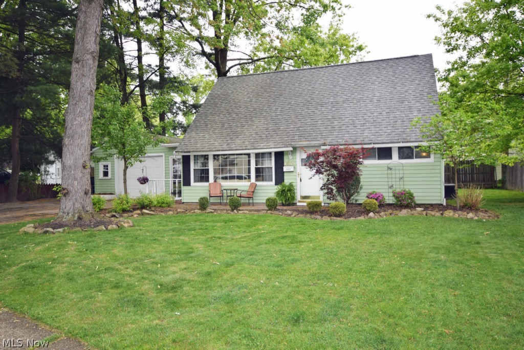 Don't miss out on this 4 bedroom cape! Privacy fence around most of the backyard with a brand new patio. White kitchen cabinets with stainless steel dishwasher and range. Remodeled bathroom with beautiful tile shower. Other recent updates include: new roof (2006), new windows (2006), new furnace & A/C (2006). Over-sized garage and extra wide driveway, no more moving cars to let another out. Finished mudroom between the house and garage which could also serve as an extra dining area or office. Call to schedule your showing today!