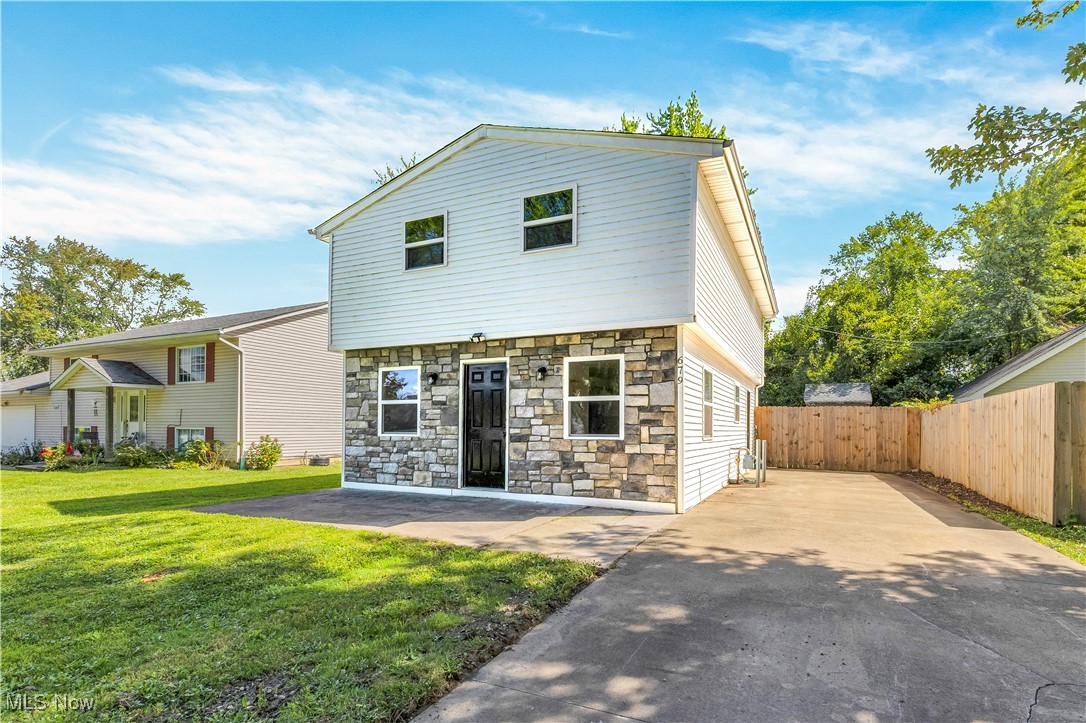 Welcome Home to this 2 bed, 2 full bath Sheffield Lake Colonial with tons of updates!!! As you pull up, you will notice the newer stone/vinyl exterior and new roof. Head inside to an open floor plan with luxury vinyl floors and light and bright rooms that were freshly painted. All appliances will stay including the washer and dryer. The updated kitchen has a walk-in pantry, grey cabinetry with brushed nickel hardware, butcher block countertops, and a beautiful geometric black and white tile backsplash. Head into the dining area off the kitchen where you can entertain with a larger dining table or bench seating for dinner parties with french-doors opening up to your backyard patio. Both the first and second floors each boast a full bath. Head upstairs to find 2 extremely spacious bedrooms with vaulted ceilings, ceiling fans, and walk-in closets. The primary has an en-suite bathroom with shower/tub combination and tile surround. Enjoy your fully fenced private backyard where you can spend time on the patio hosting cookouts. The yard space is perfect for gardening or planting flowers in such a peaceful haven. Both sheds will stay for extra storage. Hurry, to check out this beauty before it's gone!
