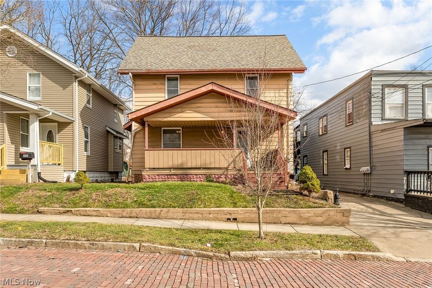 Welcome home to this lovingly maintained and spacious colonial in North Hill! The first floor offers a nicely sized living room, a formal dining room, and a fully applianced kitchen with a breakfast nook and a convenient half bath.  Upstairs you'll find  a full bathroom and 5 bedrooms with really great closet space! The lower level offers a rec room and great workshop plus cellar storage and laundry. Charming front porch and covered back patio to enjoy the outdoors. So many major mechanical updates! Brand new electric panel, replacement windows throughout, 2 year old furnace, AC replaced in 2025, and 8 year old roof.  Dont miss this one!