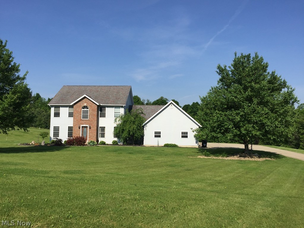 Country living near Clearfork Reservoir on 5.48 acres; this custom built home has everything you need! 3 car attached garage; main floor laundry, and a master bedroom with an on-suite and walk-on closet. Airy eat-in kitchen has plenty of cupboards and counter space.