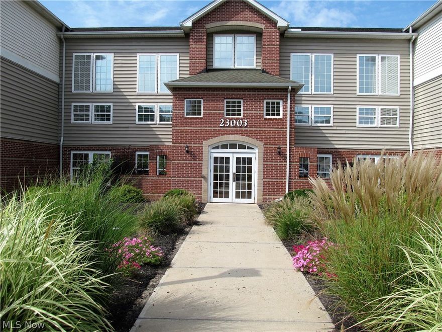 Be first or be sorry! Easy to show! Immediate possession! Only 15 years young. Original owner, immaculate corner unit. Great view on the covered balcony. Nice kitchen with breakfast bar. Living room has gas log fireplace and built-in cabinet. Dinette area with ceiling fan. Nice owner suite has full bath and walk in closet. In-suite laundry room with extra cabinets and utility sink. Big walk in closet with custom cabinets. Main bath updated. Second bedroom has walk in closet with custom cabinets and desk area. Three rooms are freshly painted. One car garage with ample shelving. Building has elevator. Includes one year HMS Home Warranty!