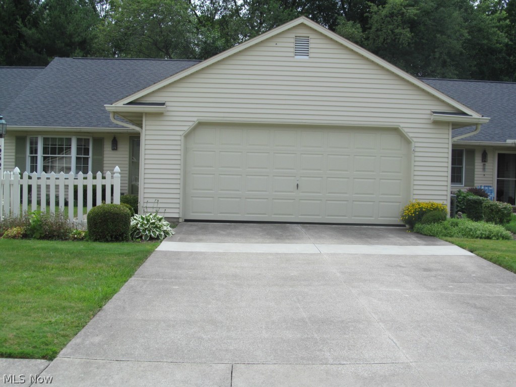 One owner condo in 55+ community. Covered entrance to foyer and large great room with vaulted ceiling and skylights, ceiling fan. Can accommodate formal dining. Glass door from great room to sun room, surrounded by windows, providing a wooded view. Kitchen includes eating area, bay window, large pantry, built-in desk, lazy Susan. Master has walk-in closet, private bathroom, linen closet. Second bedroom has 2 closets, private bathroom, linen closet. Close to great shopping and expressway. Must see. Home Warranty.