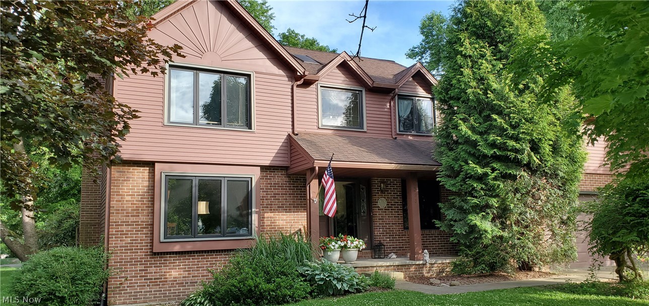 Welcome to 398 Rivermoor Dr Suffield Township in beautiful Rivermoor Estates. 3 1/2 Baths - 3 Bdrms. Master Bdrm Suite-Walk in Closet, Master Bath-Soaking Tub $ Shower. sky lite. Another full bath to service 2 -Bdrms upstairs. 2 Story Foyer-Window on 2nd floor matches lead glass windows in ft door & panels. Main Floor with 1/2 bath serves as Laundry Rm, washer & dryer stay in closet. Large Great Rm w/sunken flooring & fireplace for comfy warmth, Dining Rm w/gorgeous leaded glass chandelier. All appliance Kitchen w/new dish washer, newer frig-French Doors w/lower freezer. Newer sealed 2" THICK Hickory Wood counter tops. Kitchen has beautiful views of gorgeous fenced backyard. 3 Season Rm w/vaulted ceiling, 2 sky lite & heated for cooler weather. Sliding glass door to patio. Lower Level-Rec Rm was a man cave. Wet Bar includes 4 bar stools. Also an office could be used as 4th bed Rm w/lg closet. L/L Bath Rm w/shower. Utility Room-Kinetico Softener, 95% Furnace, Air, A O Smith Hwt 2017