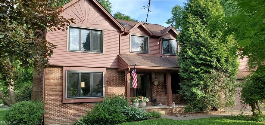 Welcome to 398 Rivermoor Dr  Suffield  Township in beautiful  Rivermoor Estates. 3 1/2 Baths - 3 Bdrms. Master Bdrm Suite-Walk in Closet, Master Bath-Soaking Tub $ Shower. sky lite. Another full bath to service 2 -Bdrms upstairs. 2 Story Foyer-Window on 2nd floor matches lead glass windows in ft door & panels.  Main Floor with 1/2 bath serves as Laundry Rm, washer & dryer stay in closet. Large Great Rm w/sunken flooring & fireplace for comfy warmth, Dining Rm w/gorgeous leaded glass chandelier. All appliance Kitchen w/new dish washer, newer frig-French Doors w/lower freezer. Newer sealed 2" THICK Hickory Wood counter tops. Kitchen has beautiful views of gorgeous fenced backyard. 3 Season Rm w/vaulted ceiling, 2 sky lite & heated for cooler weather. Sliding glass door to patio. Lower Level-Rec Rm was a man cave. Wet Bar includes 4 bar stools. Also an office could be used as 4th bed Rm w/lg closet. L/L Bath Rm w/shower. Utility Room-Kinetico Softener, 95% Furnace, Air, A O Smith Hwt 2017