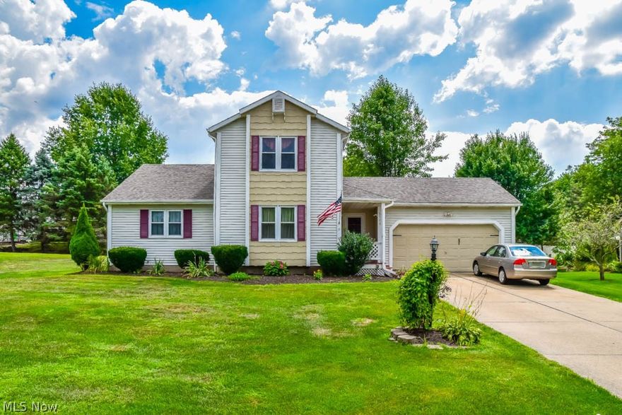 Unique floor plan at this 3 bedroom, 2 full bath home in Jackson Township! Prepare your favorite dishes in the open and updated kitchen with a center island and beautiful ceiling! It opens to the 2-story dining room with thick wood beams, a skylight and access to the back deck. Enjoy quality family time in the great room with a loft and a lovely fireplace. There are 2 bedrooms on the main level with bedroom 2 having direct access to the large full bath. Upstairs, you'll love the secluded master suite with the entire second floor to yourself! Offering a walk-in closet, linen closet, a sitting room and a private full bath boasting a soaking tub with a skylight, it's a perfect at-home getaway! Bonus first floor laundry room with a closet and access to the 2-car attached garage. Nearly 500 sqft of extra living space on the lower level with a finished rec room and partially finished bonus room including a play area under the stairs. Plus plenty of unfinished space for storage! Relax your su