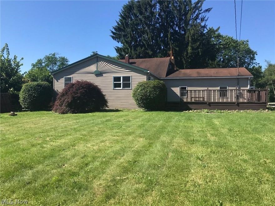 Vinyl sided 3 bedroom, 1.5 bath home on level lot in country-like location.  Large deck for outside entertaining.  8 X 10 shed in rear yard.