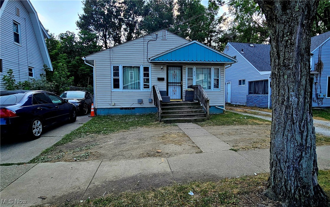 Opportunity awaits in this 2 bed, 2 bath Akron home with great potential! Features include a reconditioned HVAC system, new vanities and toilets, and updated fixtures. The downstairs bath is nearly complete just needs walls to finish. A few siding panels may need attention, and paint/flooring will bring your finishing touch. Great potential for a starter home or investment. Property sold AS-IS.