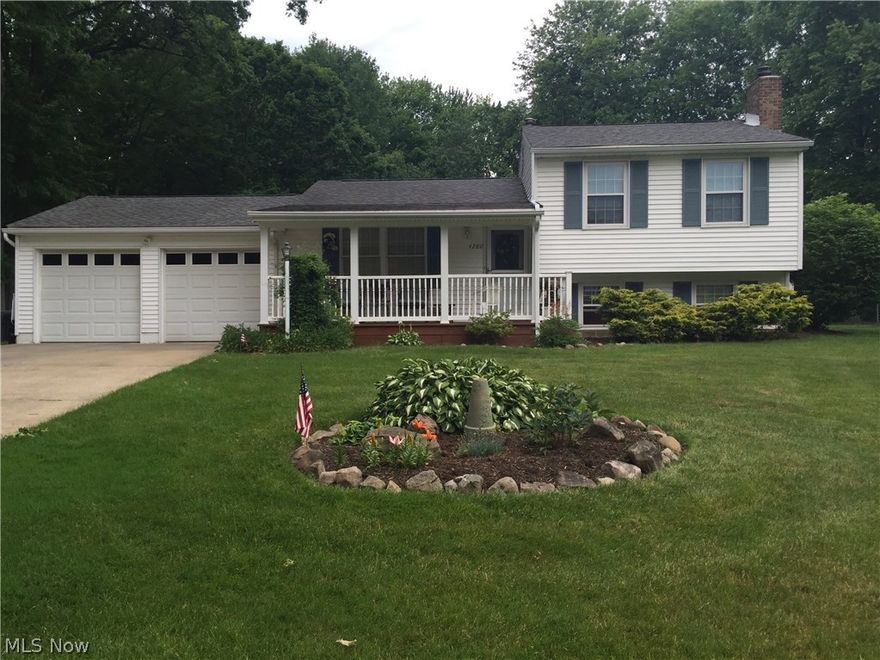 Park-like setting in the heart of Stow. Beautifully landscaped yard with fountain. 3 bedrooms and 2 full baths. Fully fenced in yard. Real oak wood cabinets in kitchen. Real oak trim throughout. Wet bar in family room. Waterproofed basement. Game room. Sun room with gas heater, and so much more! Make your appointment today.