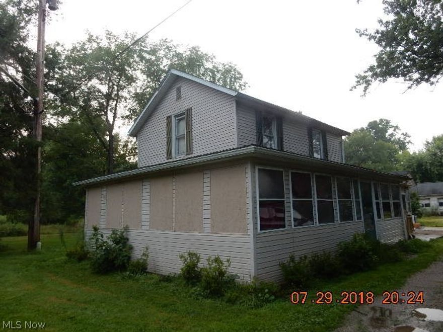 Fixer upper located on a large lot with a 36 x 24 detached garage.