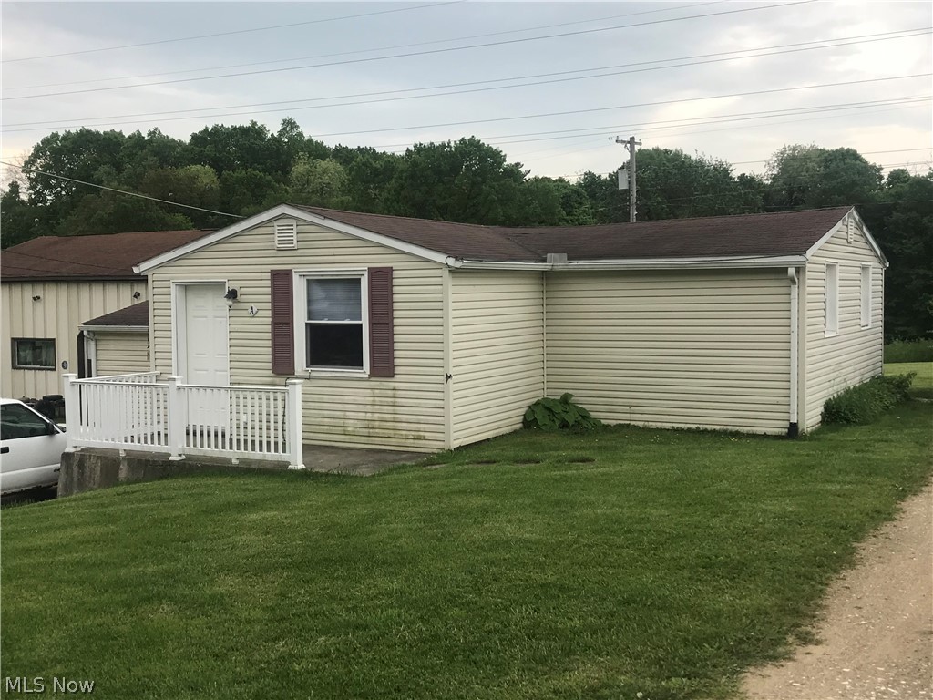 Very nicely updated duplex in a quite area, close to major highways. Great rental history. Large 30' X 40' garage on the lot. Situated on 3 lots with plenty of yard.