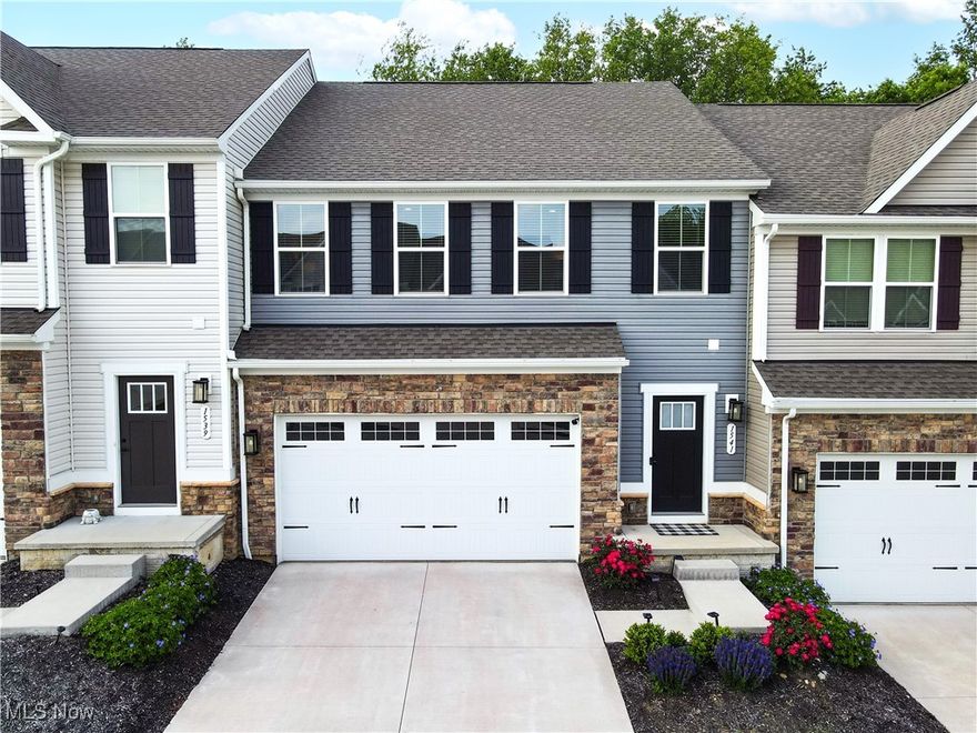 Welcome to 1541 Spruce Hill Dr, a beautifully maintained 3-bedroom, 2.5-bath townhome located in the desirable Towns of Cedar Crest. Built-in 2022, this 1,838 sq ft home offers modern living in a prime location between Hudson and Stow, with easy access to highways and shopping.

The main floor features an open-concept layout filled with natural light, connecting the great room, dining area, and a stunning white kitchen complete with stainless steel appliances. Upstairs, the spacious master suite includes two walk-in closets and a private bathroom with a walk-in shower. Two additional bedrooms, a full bath, and a convenient laundry room complete the second level.

Enjoy the newly added back deck—perfect for relaxing or entertaining—and benefit from a clean, unfinished basement that offers endless potential. A radon mitigation system has already been installed for peace of mind.

Experience low-maintenance living with exterior upkeep included in this vibrant townhome community. Don't miss your chance to own this stylish and move-in-ready home!