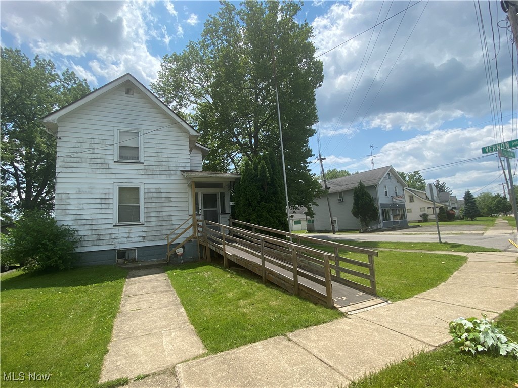 A great starter home, or a good fine for a first time investor, This property comes with a long term section 8, tenant that has know desire to move. 2 Bed Rms. up stairs, A large eat in kitchen. A big two car garage. Newer furnace and hot water tank.
Comes with a enclosed sun porch. Do not delay it will not last long.