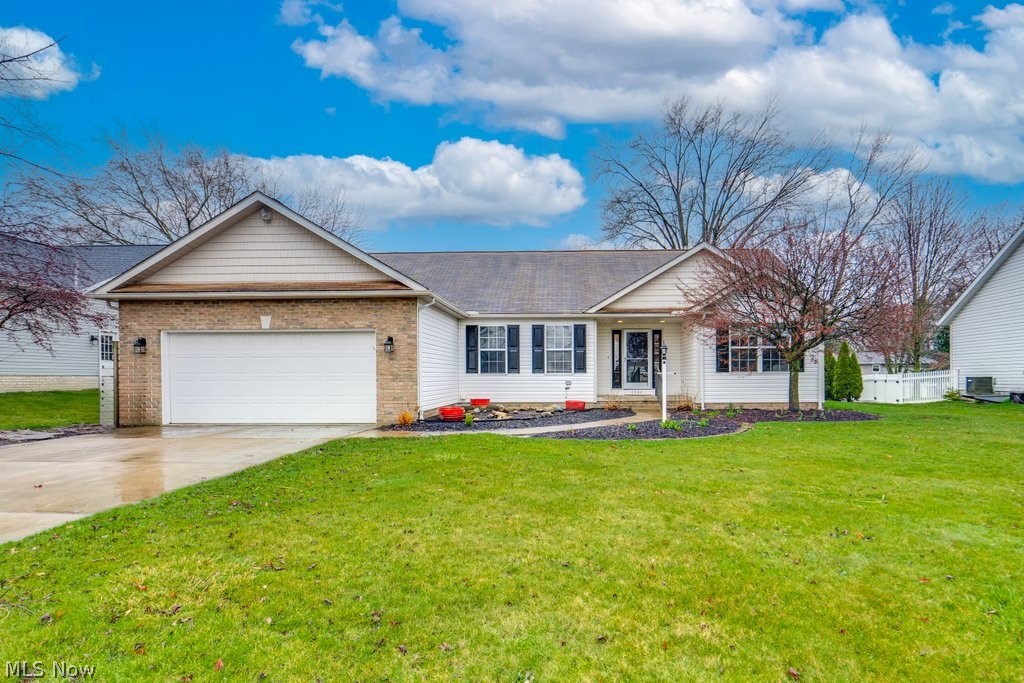 Beautifully updated home in a desirable location, this 3 bedroom split ranch home is sure to impress! The entryway opens to the large family room featuring cathedral ceilings and a welcoming gas fireplace. The open layout kitchen has gorgeous quartz countertops, stainless appliances and room for a dining table that overlooks the deck and fenced-in backyard; perfect for entertaining! Dedicated office off the great room has plenty of natural light and features a built-in desk that could be used for multiple purposes. First floor laundry room with direct access from the 2 car attached garage. Primary bedroom has his and hers closets and an ensuite bathroom. Huge full basement could be finished for a recreational room or second family room. Vinyl flooring throughout the majority of the first level. This one won’t last long! Call today to schedule your private showing.